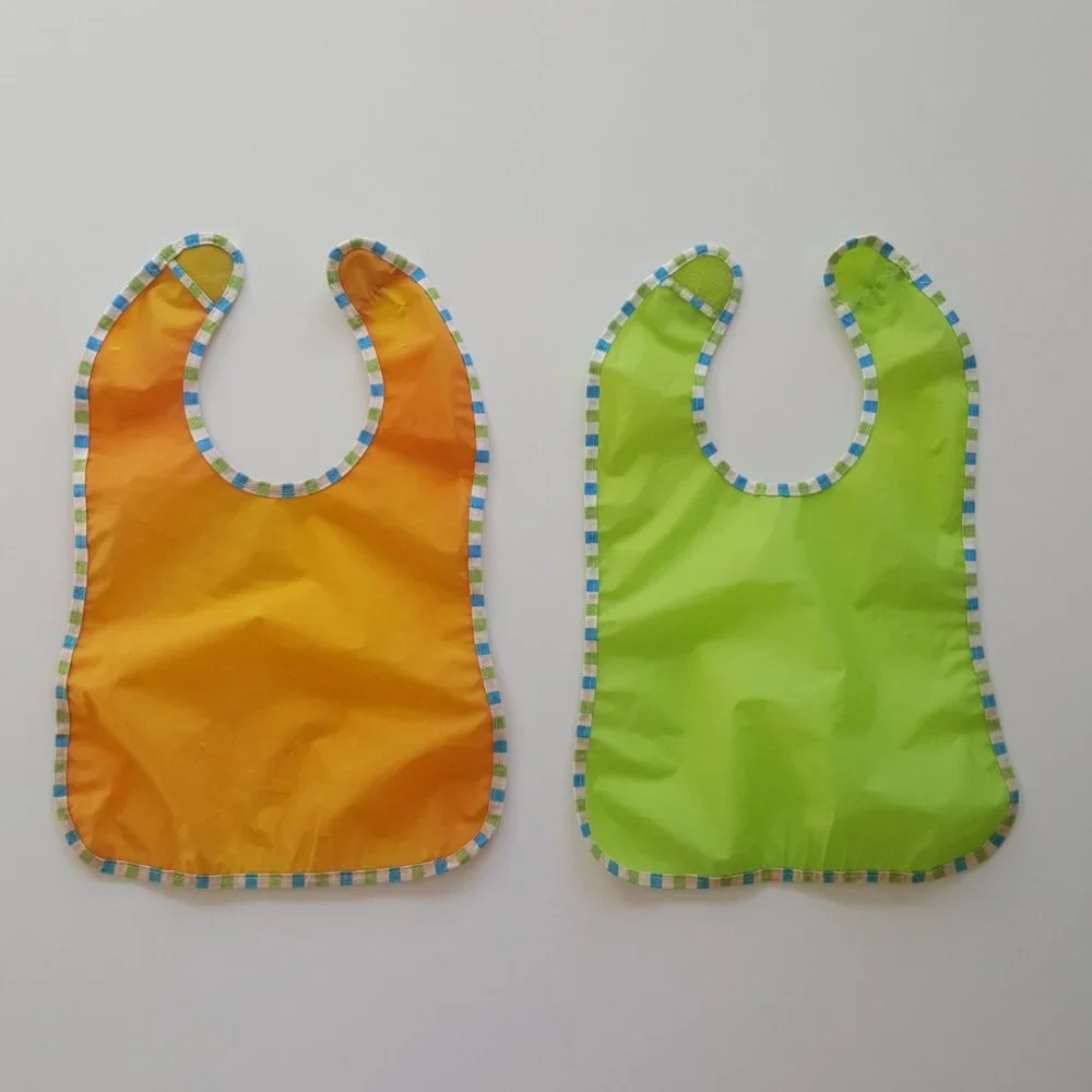 IKEA KLADD RANDIG Bibs, green, orange, 2 pack